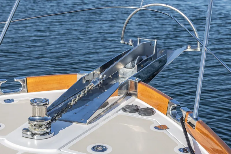 Slide: The Image of Bow of 2012 Grand Banks 46 Eastbay SX yacht with anchor chain and winch. - 38