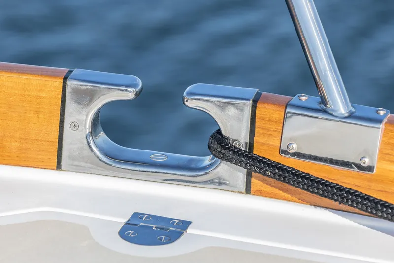 Slide: The Image of Close-up of a 2012 Grand Banks 46 Eastbay SX boat cleat with rope. - 39