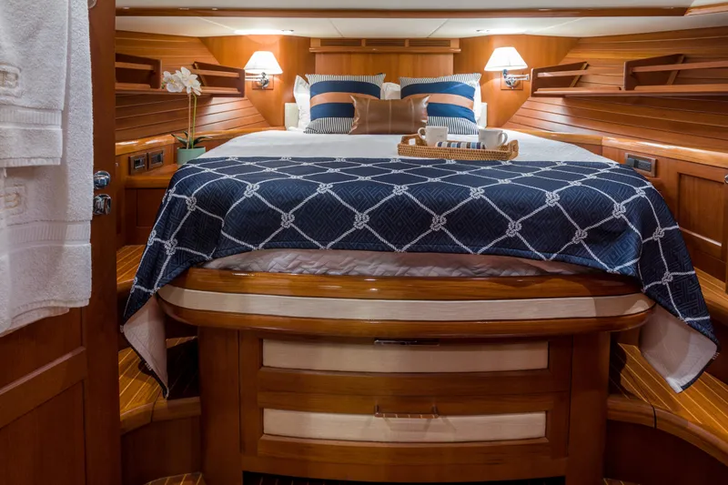 Slide: The Image of Luxurious cabin interior of 2012 Grand Banks 46 Eastbay SX yacht with elegant bedding. - 6