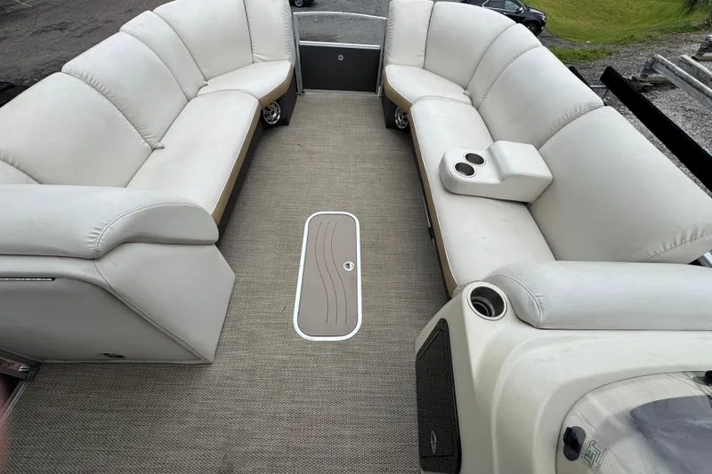 Slide: The Image of Luxurious interior of 2017 Sweetwater Premium Edition 255 SL pontoon boat with plush seating. - 3