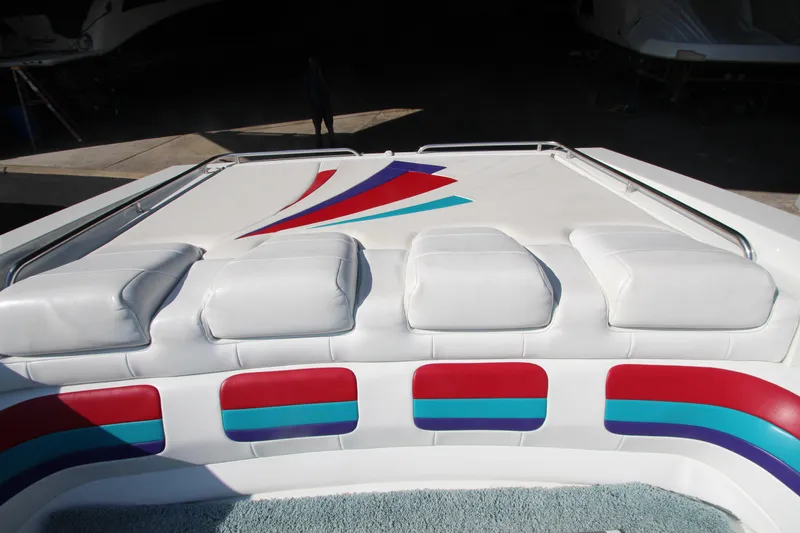 Slide: The Image of 1995 Formula SR1 303 boat with colorful upholstery and sleek design. - 15