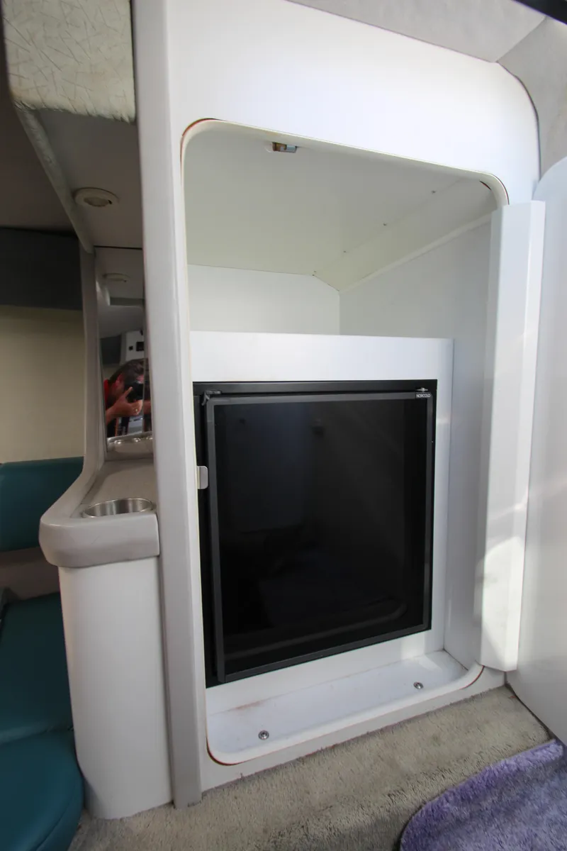 Slide: The Image of 1995 Formula SR1 303 interior with built-in mini fridge. - 27