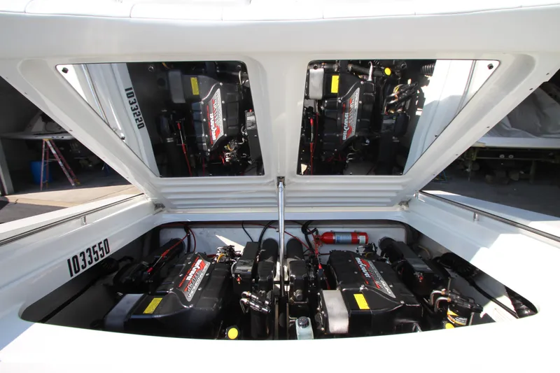 Slide: The Image of Engine compartment of a 1995 Formula SR1 303 boat, showcasing dual engines. - 30
