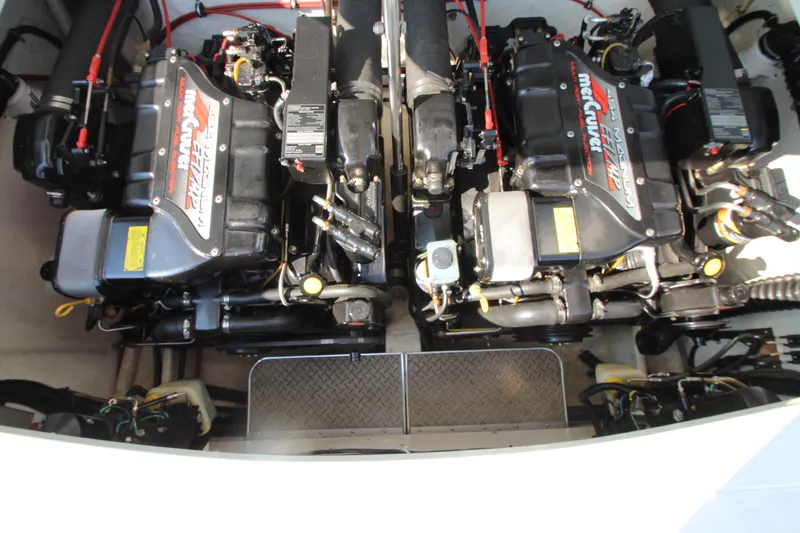 Slide: The Image of Twin MerCruiser engines in a 1995 Formula SR1 303 boat. - 31
