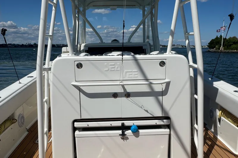 Slide: The Image of 2018 SeaVee 390Z boat interior with fishing equipment, on a sunny day. - 39
