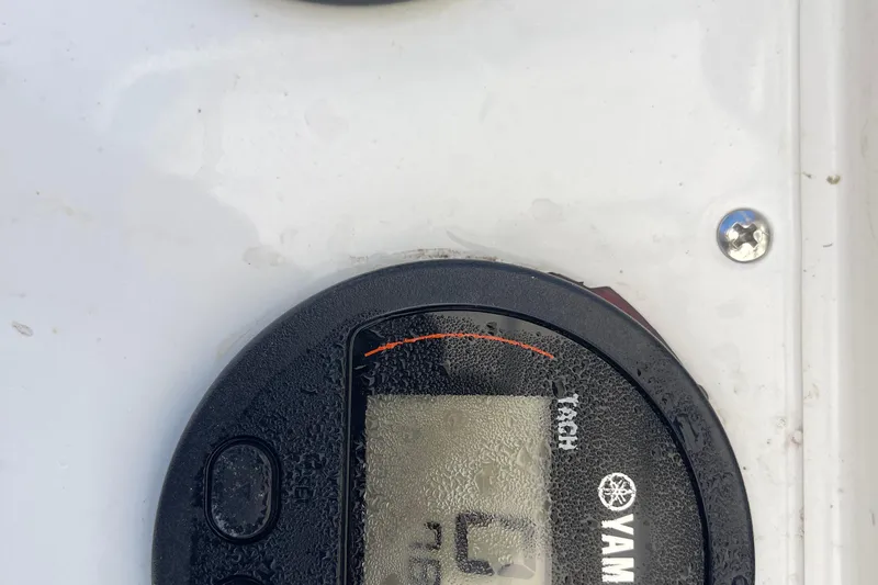 Slide: The Image of Close-up of a Yamaha gauge on a 2002 Fountain 38 CC Tournament Edition boat. - 12