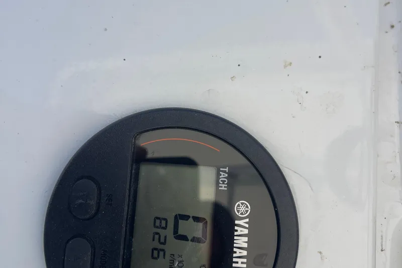 Slide: The Image of Yamaha tachometer on 2002 Fountain 38 CC Tournament Edition boat dashboard. - 13