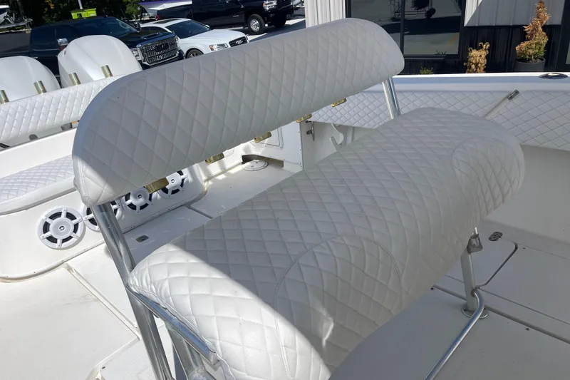 Slide: The Image of White quilted seating on 2002 Fountain 38 CC Tournament Edition boat deck. - 16