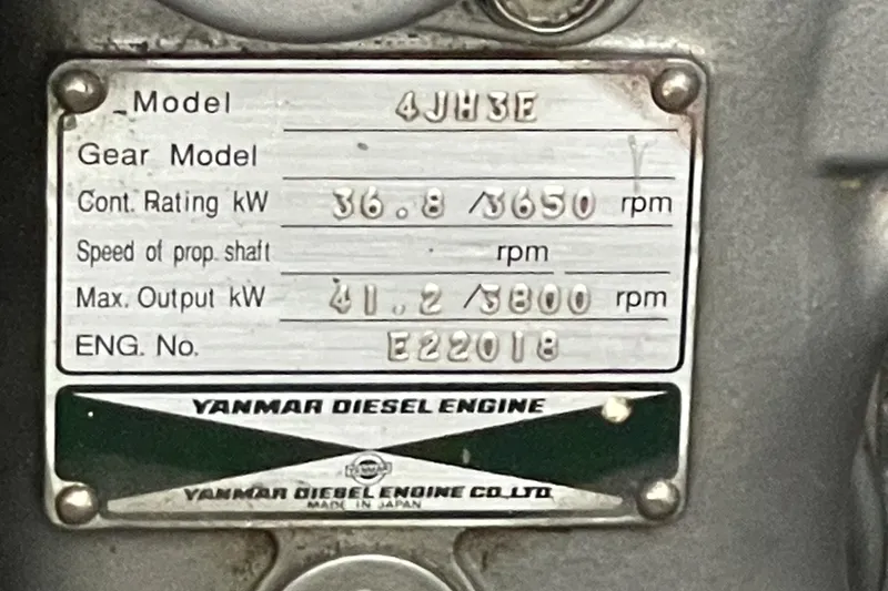 Slide: The Image of Yanmar diesel engine plate with specifications for Catalina 42, 2001 model. - 21