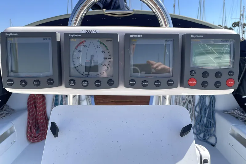 Slide: The Image of Catalina 42 sailboat cockpit with Raytheon navigation instruments, 2001 model. - 22