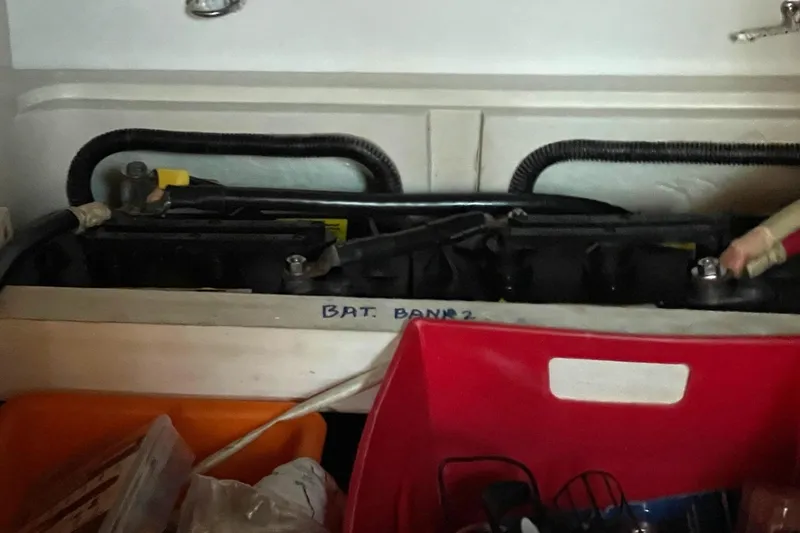 Slide: The Image of Battery compartment labeled "BAT. BANK 2" in a 2001 Catalina 42 sailboat. - 23