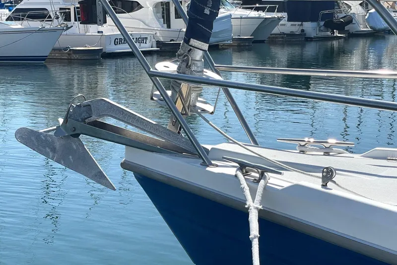 Slide: The Image of Bow of a 2001 Catalina 42 sailboat with anchor in marina. - 26