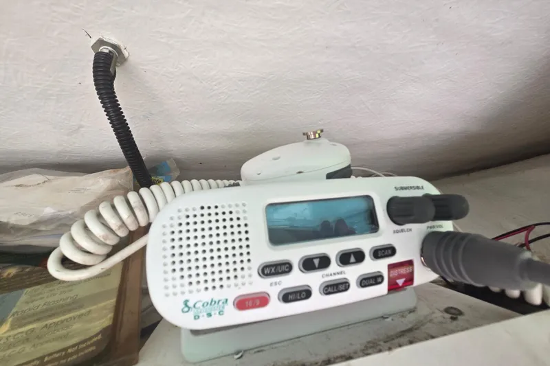 Slide: The Image of Cobra marine radio on 2005 Trophy 2352 Walkaround boat dashboard. - 10