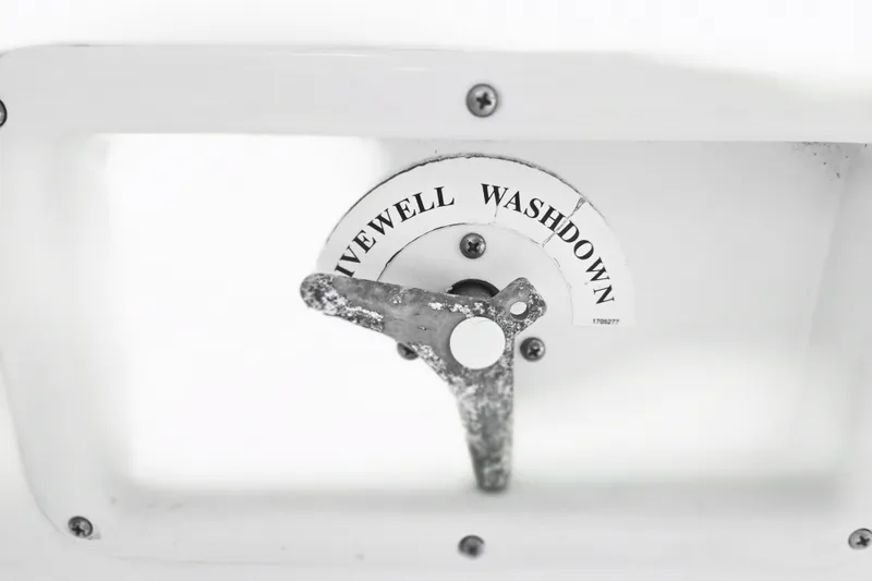 Slide: The Image of 2005 Trophy Sportfishing boat livewell washdown control lever. - 18