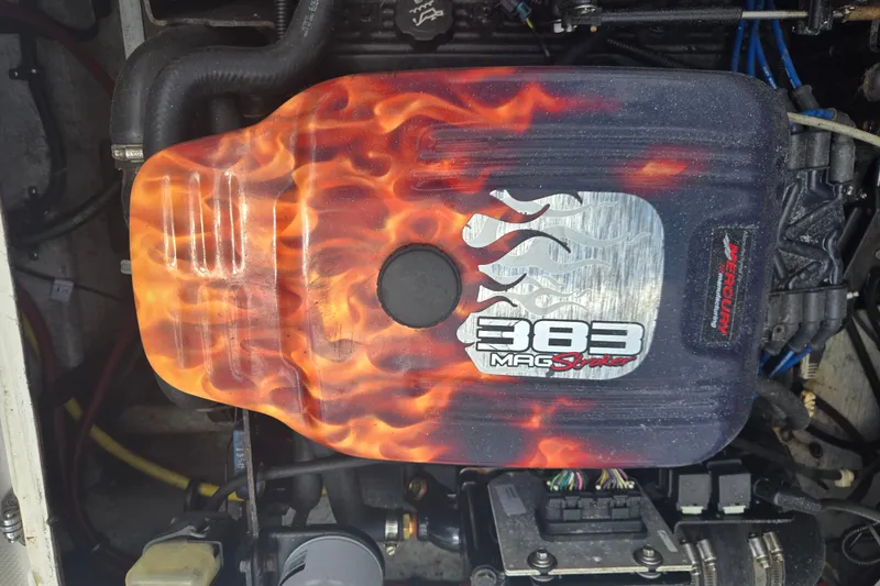 Slide: The Image of Mercury 383 Mag Stroker engine with flame design in 2005 Trophy Sportfishing boat. - 33