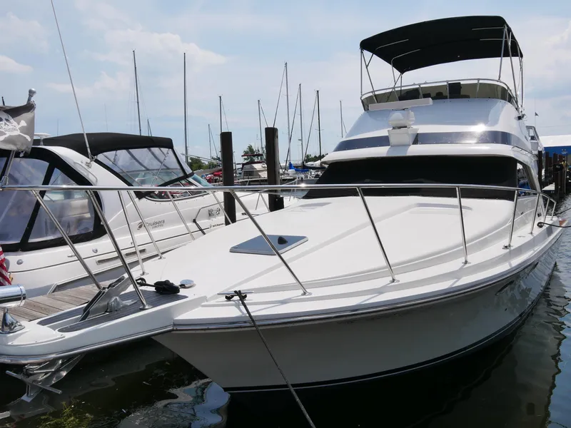 The Image of 1987 Trojan 10.8 Meter Sedan yacht docked at marina. - 0