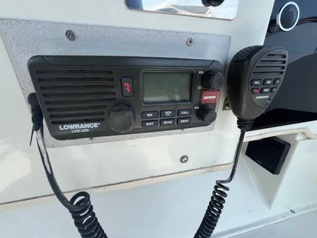 Slide: The Image of Lowrance LVR-250 marine radio on a 1987 Trojan 10.8 Meter Sedan boat. - 24