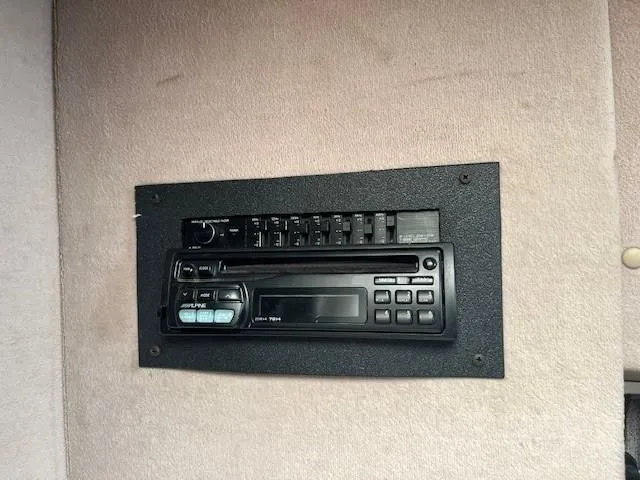 Slide: The Image of 1987 Trojan 10.8 Meter Sedan stereo system with cassette player and equalizer. - 25