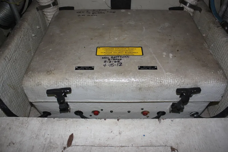 Slide: The Image of Battery compartment of a 1987 Trojan 10.8 Meter Sedan boat. - 46