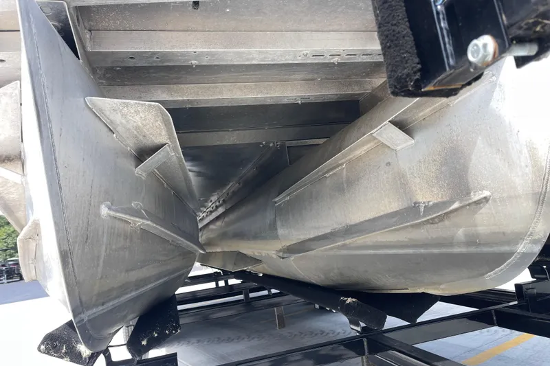 Slide: The Image of Underneath view of a 2020 Crest 250 Caribbean pontoon boat on a trailer. - 12