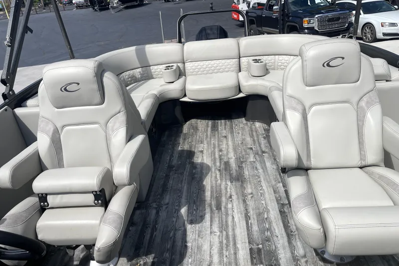 Slide: The Image of 2020 Crest 250 Caribbean boat interior with luxurious seating and modern design. - 16