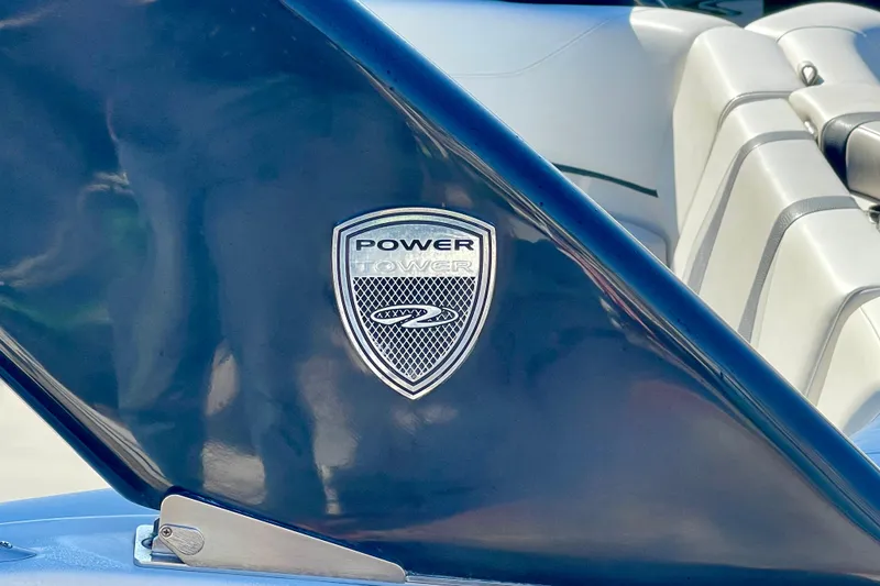 Slide: The Image of Close-up of 2016 Regal 23 OBX Power Tower emblem on boat. - 13