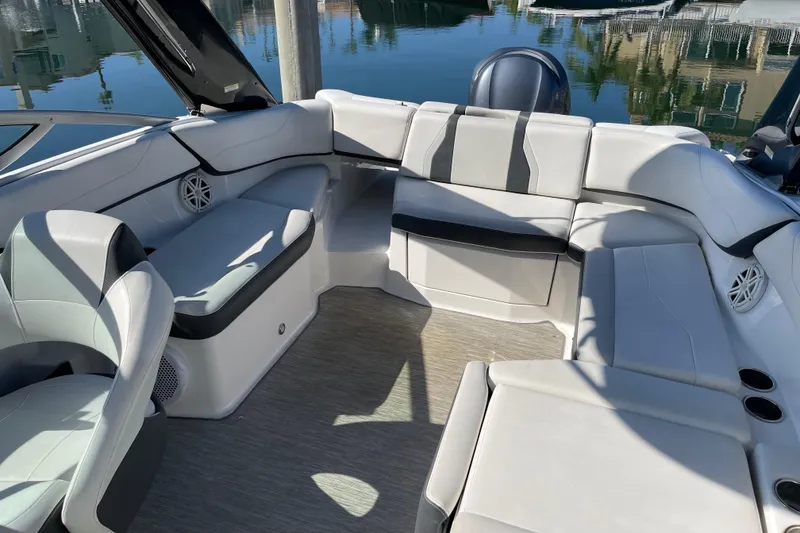 Slide: The Image of Interior of a 2016 Regal 23 OBX boat with spacious seating and modern design. - 33