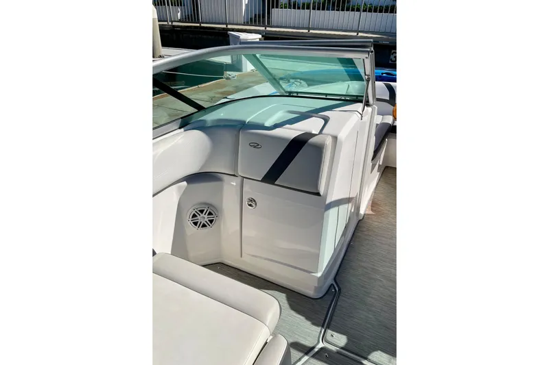 Slide: The Image of 2016 Regal 23 OBX boat interior with seating and windshield. - 39