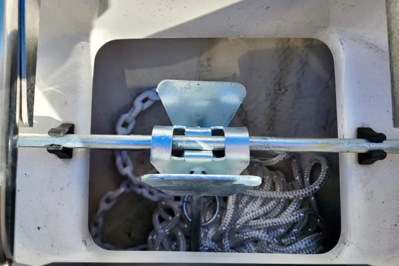 Slide: The Image of Anchor locker of 2016 Regal 23 OBX boat with chain and rope. - 44