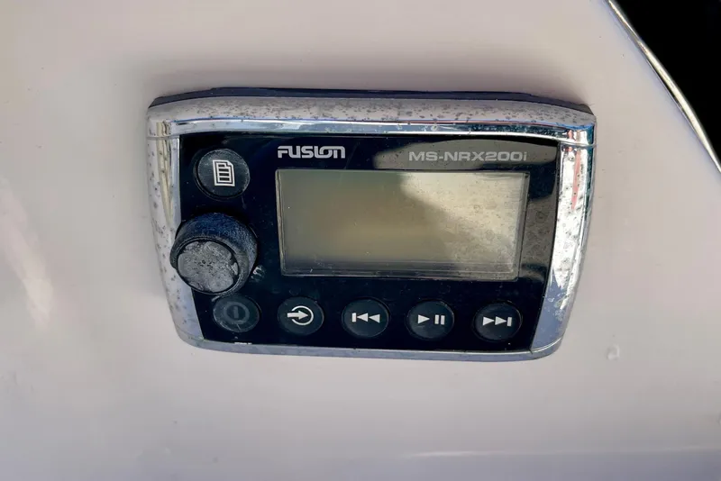 Slide: The Image of Fusion MS-NRX200i marine stereo control on 2016 Regal 23 OBX boat. - 49