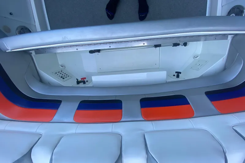 Slide: The Image of 2008 Formula 382 FASTech boat interior with colorful seating and storage compartment. - 10