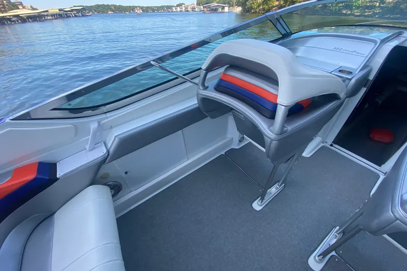 Slide: The Image of 2008 Formula 382 FASTech boat interior with sleek seating and lake view. - 11