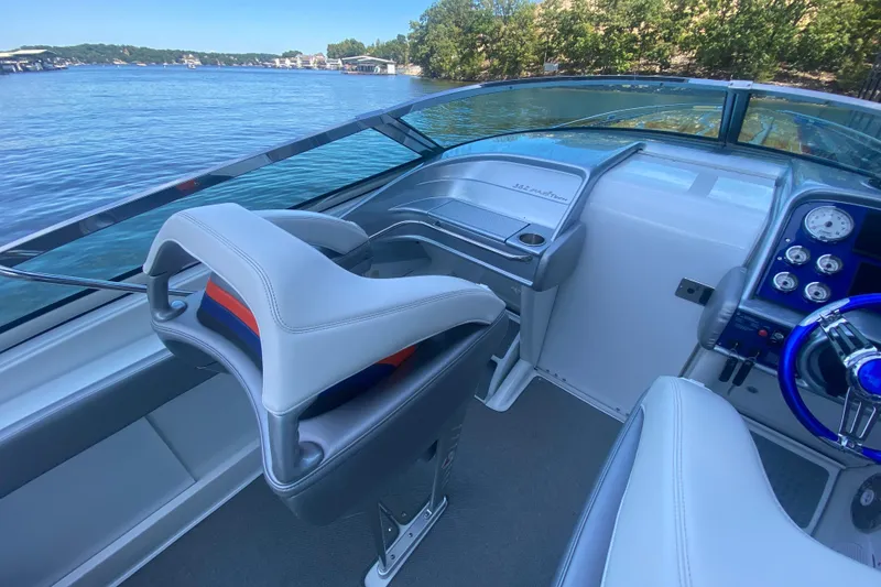 Slide: The Image of Interior of 2008 Formula 382 FASTech boat with sleek seating and control panel. - 12