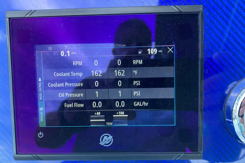 Slide: The Image of Digital dashboard of a 2008 Formula 382 FASTech boat displaying engine metrics. - 17