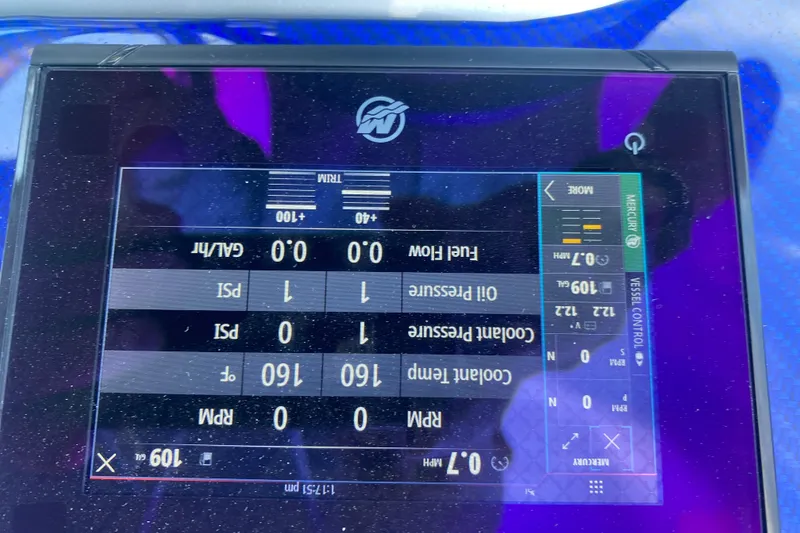 Slide: The Image of Dashboard display of a 2008 Formula 382 FASTech boat showing engine metrics. - 19