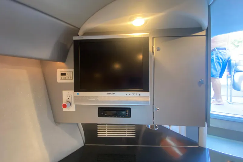 Slide: The Image of 2008 Formula 382 FASTech cabin with Sharp TV and control panel. - 21