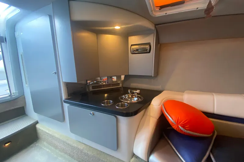 Slide: The Image of 2008 Formula 382 FASTech cabin interior with kitchenette and seating area. - 22