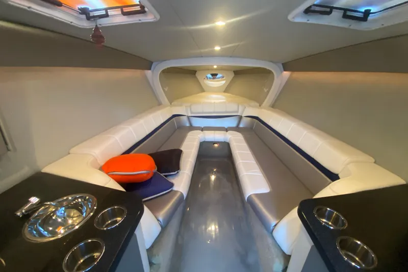 Slide: The Image of Luxurious interior of 2008 Formula 382 FASTech boat with plush seating and modern amenities. - 23
