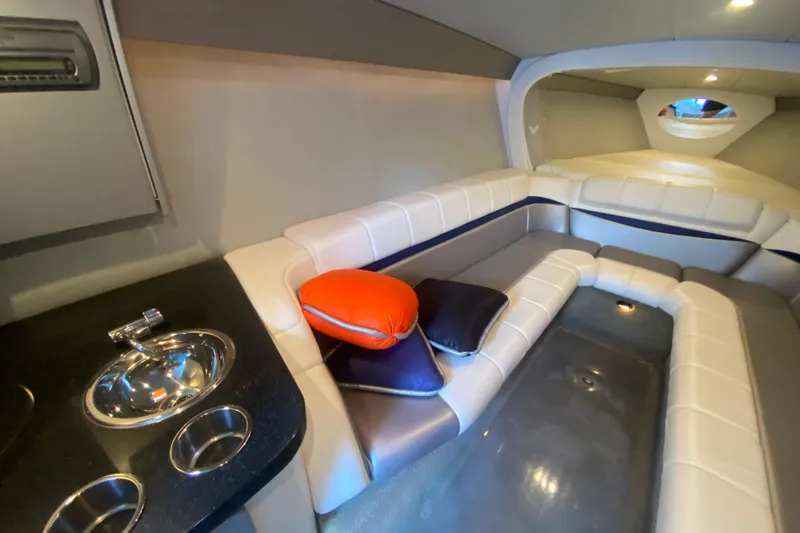 Slide: The Image of 2008 Formula 382 FASTech cabin interior with seating and sink. - 25