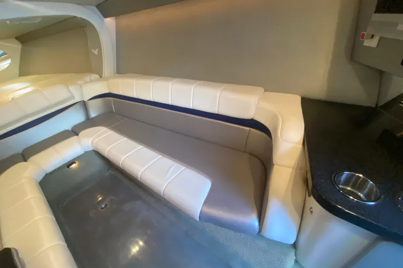 Slide: The Image of Interior of 2008 Formula 382 FASTech boat with white and gray seating. - 26
