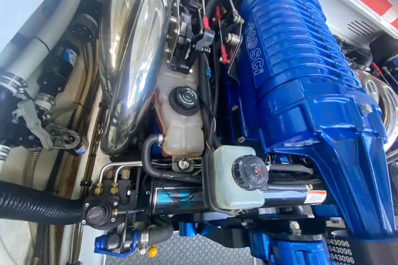 Slide: The Image of Engine compartment of a 2008 Formula 382 FASTech with blue 600 SCI engine components. - 35