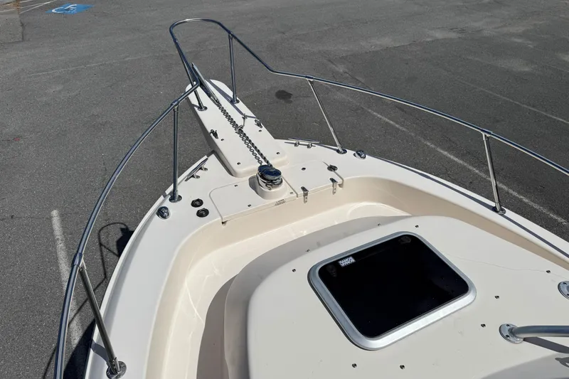 Slide: The Image of 2015 Grady-White Journey 258 boat deck with railing and anchor chain. - 8