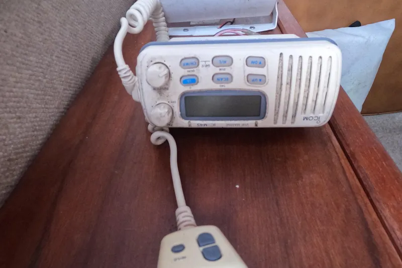 Slide: The Image of Vintage Icom marine radio on wooden surface, Mako 228, 1982 model. - 13