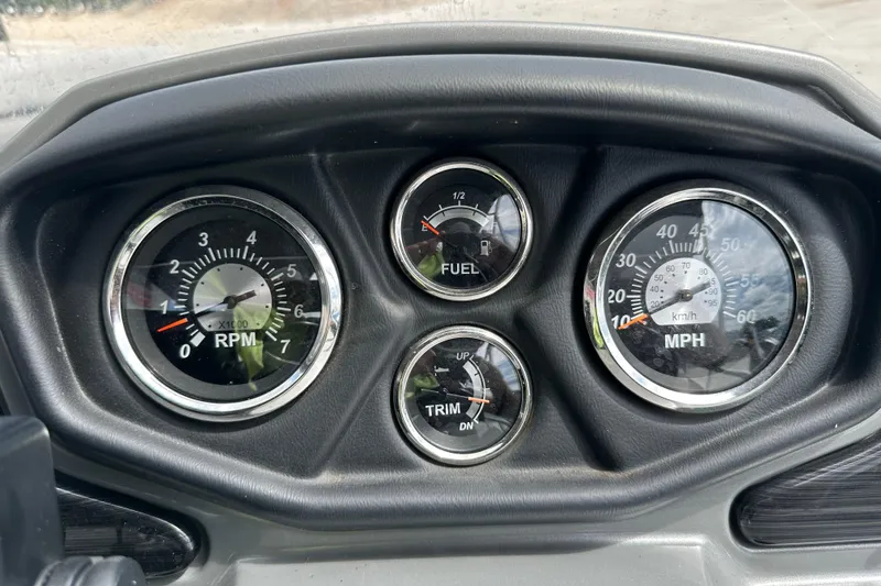 Slide: The Image of Dashboard of 2019 Lowe SS270 boat with RPM, fuel, trim, and speed gauges. - 10