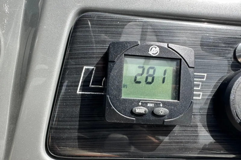 Slide: The Image of Digital display on 2019 Lowe SS270 Extended Walk-Thru boat dashboard showing "281". - 24