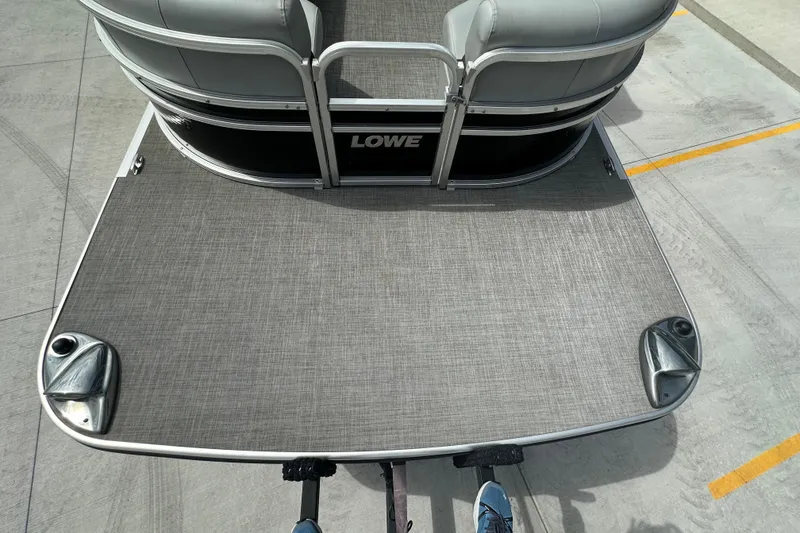 Slide: The Image of 2019 Lowe SS270 Extended Walk-Thru pontoon boat on trailer, top view. - 7