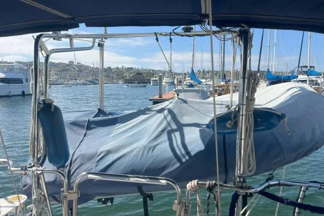Slide: The Image of Catalina 34 Mk II sailboat in marina, covered deck, clear sky, 2000 model. - 31
