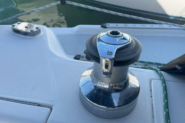 Slide: The Image of Winch on 2000 Catalina 34 Mk II sailboat deck, with rope and fittings. - 35