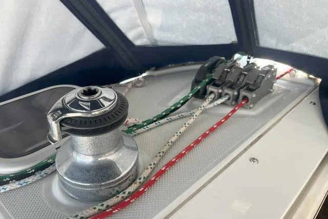 Slide: The Image of Winch and rope clutches on a 2000 Catalina 34 Mk II sailboat deck. - 36