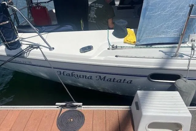 Slide: The Image of Catalina 34 Mk II sailboat named "Hakuna Matata" docked at a marina, 2000 model. - 42